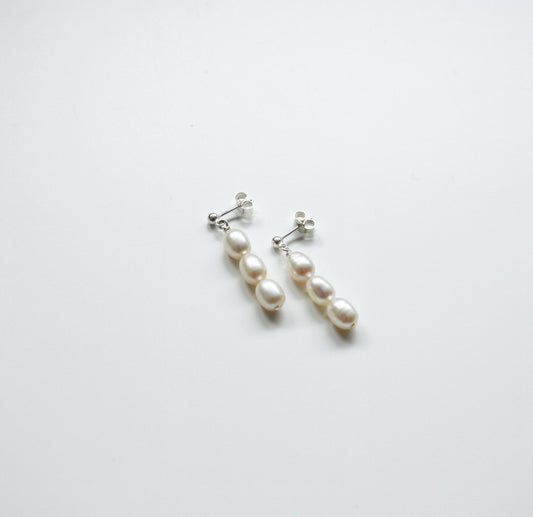 Three Pearl Studs