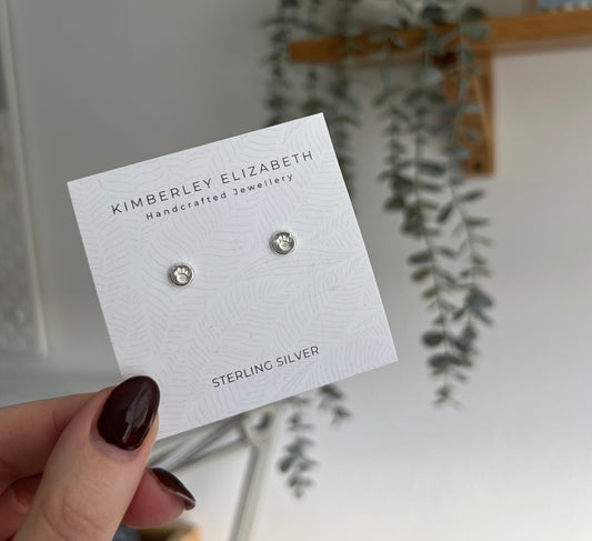Paw print stud earrings